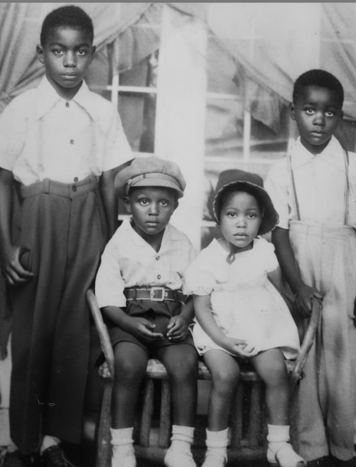 Idell as a child with siblings